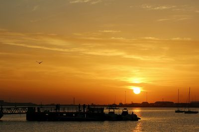 Scenic view of sea at sunset