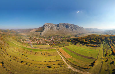 Aerial panorama image of piatra secuiului mountain and rimetea, torocko, village in transylvania