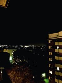 High angle view of illuminated buildings at night