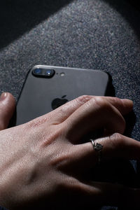 Close-up of man using mobile phone