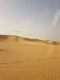 Scenic view of desert against sky