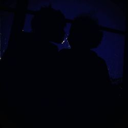 Blurred motion of people in amusement park