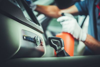 Close-up of man driving car