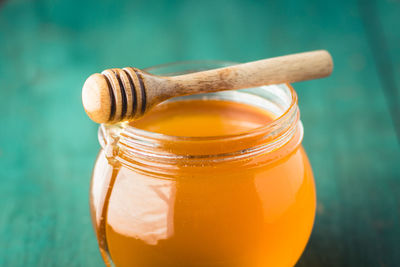 Close-up of honey in jar on table