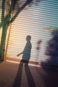 Shadow of boy on floor