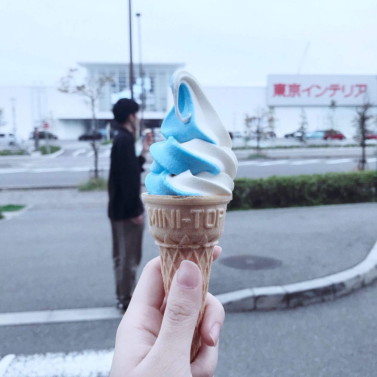 sweet, sweet food, frozen food, indulgence, frozen, human hand, ice cream, one person, dessert, real people, temptation, cone, hand, ice cream cone, focus on foreground, food and drink, dairy product, holding, day, food, outdoors, finger