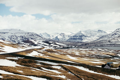 Scenic view of snow covered mountains