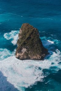 High angle view of rocks in sea