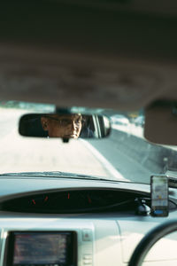 Rear view mirror reflection of driver