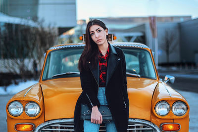 Young woman in car