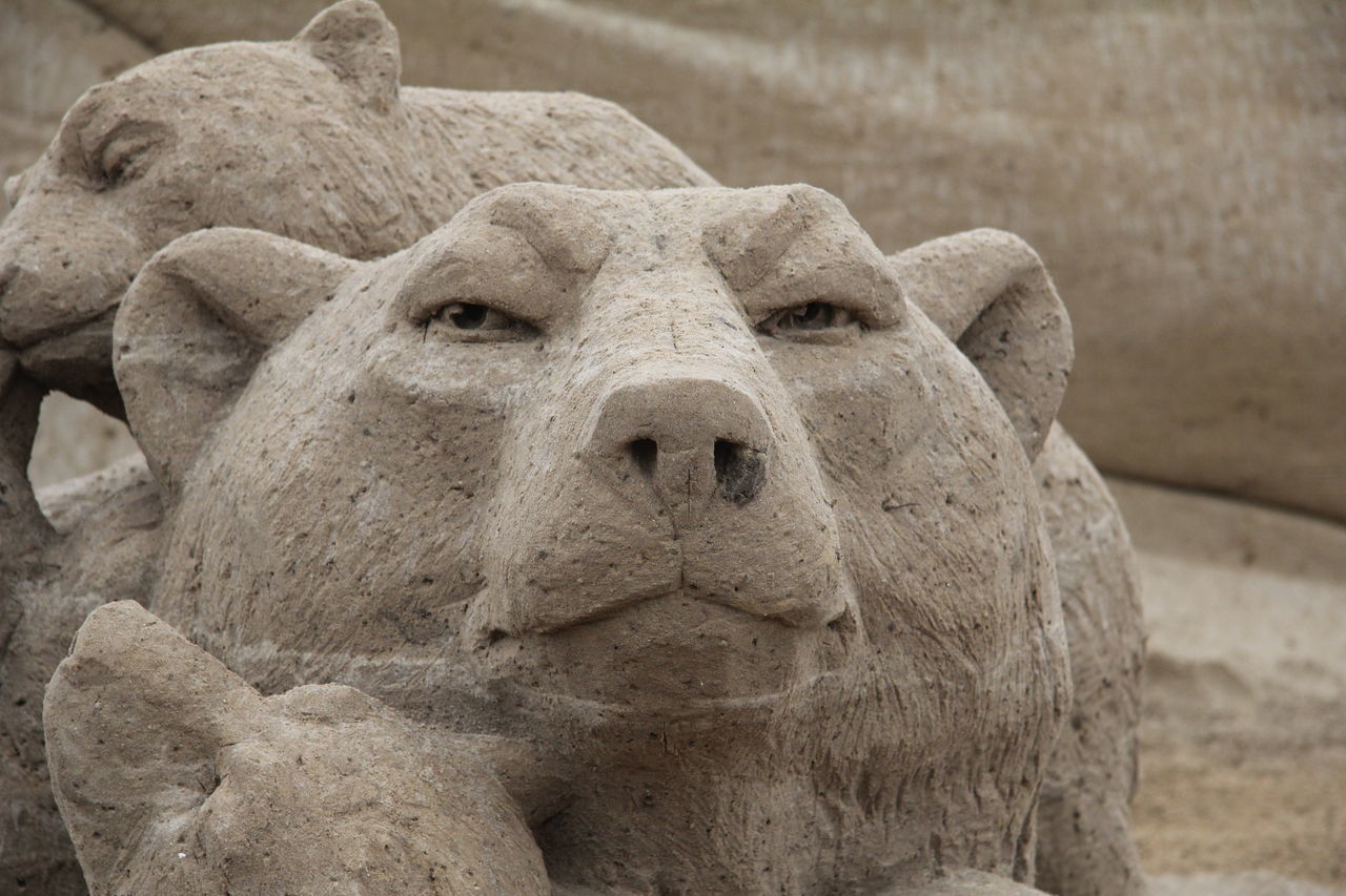 sculpture, art and craft, art, human representation, statue, close-up, creativity, focus on foreground, carving - craft product, stone material, animal representation, day, outdoors, craft, no people, old, stone, history