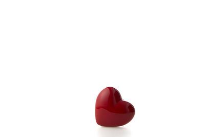 Close-up of heart shape over white background