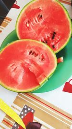 High angle view of fruits in plate on table