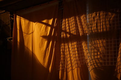 Close-up of curtain against window