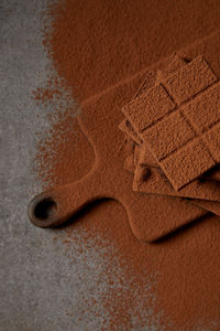 High angle view of chocolate on cutting board