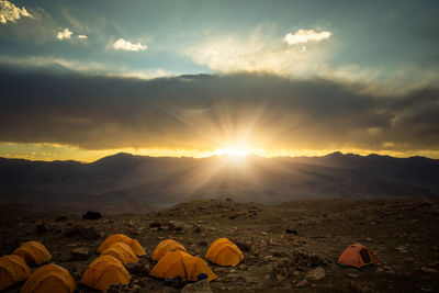 Scenic view of mountains against sky during sunset