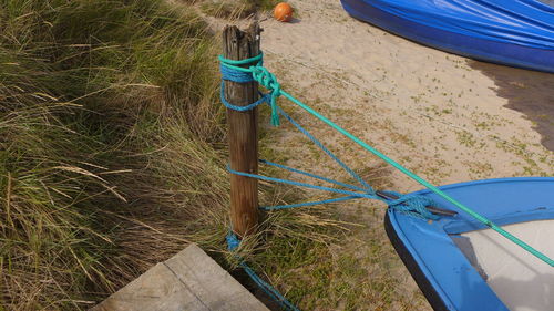 Boats moored at beach