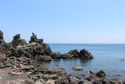 Scenic view of sea against clear sky