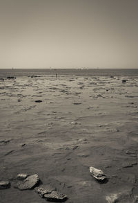 Scenic view of beach against clear sky