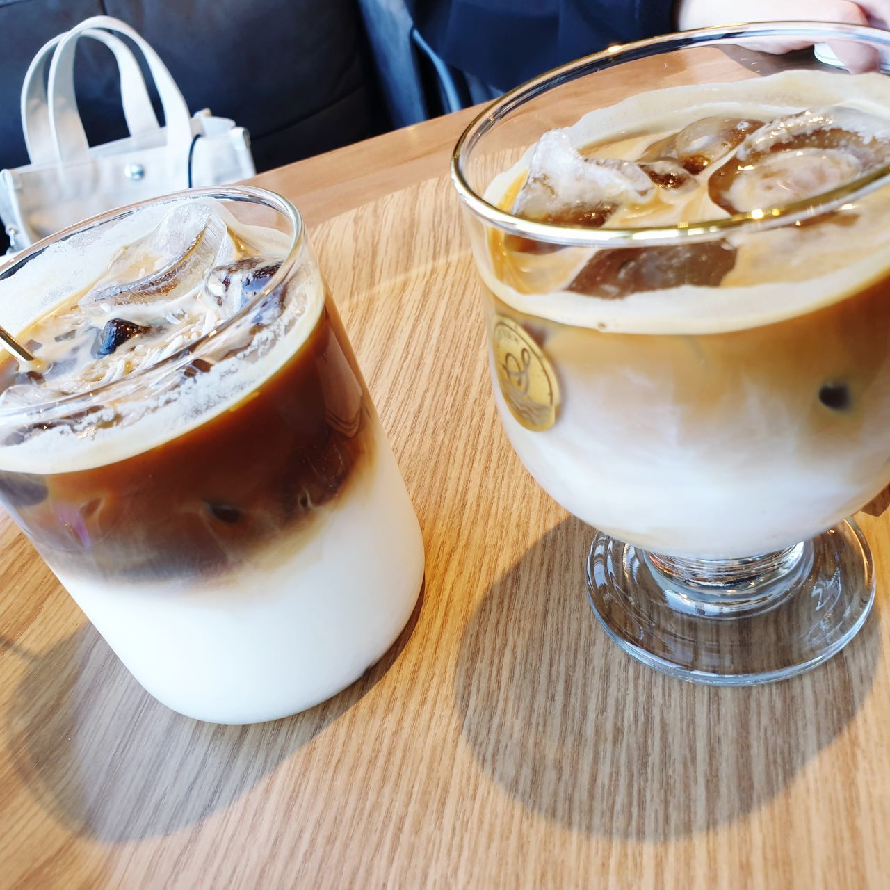 CLOSE-UP OF COFFEE AND GLASS OF TABLE