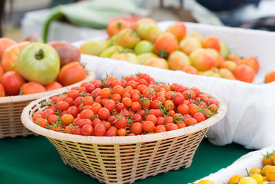 Fresh fruits in basket at market stall