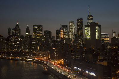 Illuminated city lit up at night