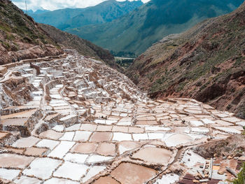 High angle view of landscape with mountain range in background