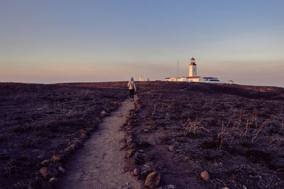 Scenic view of lighthouse against sky during sunset