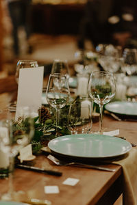 Close-up of wineglasses on table