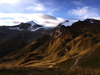 Scenic view of snowcapped mountains against sky