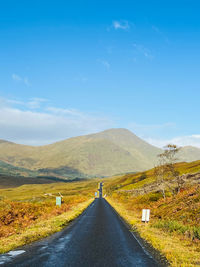 Empty road against sky