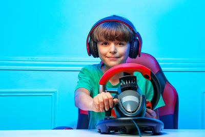 Portrait of boy playing in gym