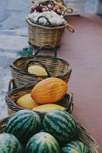 High angle view of fruits in basket on table at market