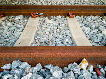 High angle view of stones on railroad track