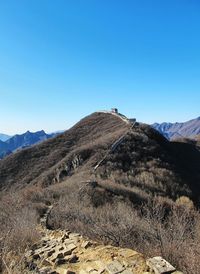 Great wall of china against blue sky