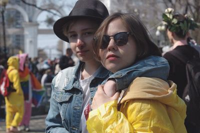 Portrait of friends wearing standing outdoors