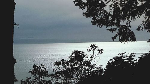 Scenic view of sea against sky at sunset