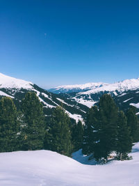 Idyllic shot of snowcapped mountains against clear sky