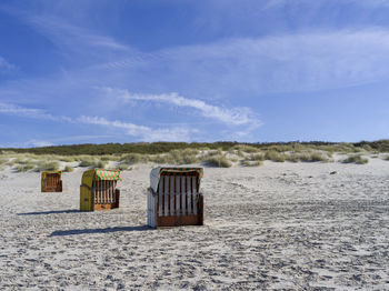 Hooded beach chairs on the island of juist, germany