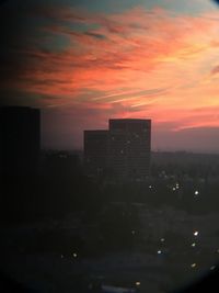 View of cityscape against sky during sunset