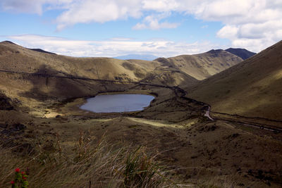 Scenic view of landscape and mountains against sky