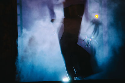 Blurred motion of people at night