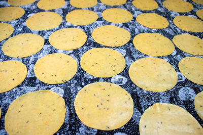 Khichiya papdi papad rice flour crackers or papadom drying, chawal ke papad