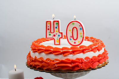 Close-up of birthday cake on table