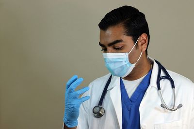 Close-up of man wearing mask