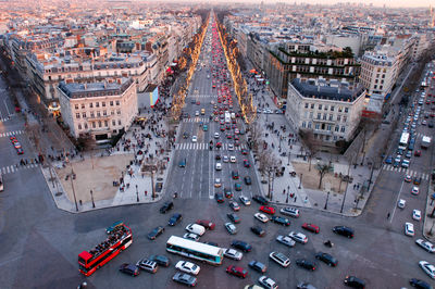 High angle view of busy street amidst buildings in city