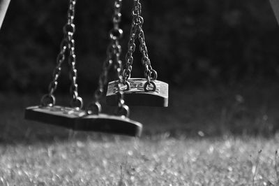 Close-up of swing at playground