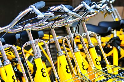 Close-up of yellow bicycles