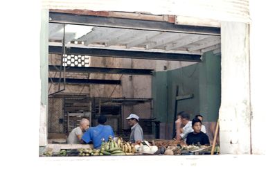 People sitting outside building