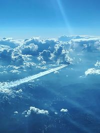 Aerial view of vapor trail in sky